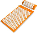 Acupressure mat and roller with white nodes on an orange background