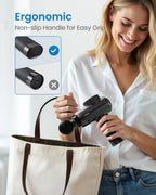 Woman holding a handheld device with an ergonomic non-slip handle, smiling.