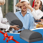 Person receiving a gray car seat cover as a gift with festive decorations and people in the background.