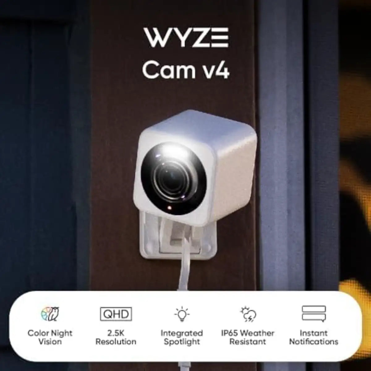 Wyze Cam v4 security camera attached to a wall with features listed below.