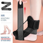 Black ankle support brace with adjustable strap on a person's foot, showing measurement guide on the side.