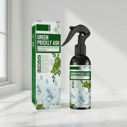 Green Prickly Ash Environmental Mite Remover spray bottle and packaging on a white surface.