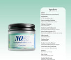 NOBS toothpaste jar with ingredient list on a light green background